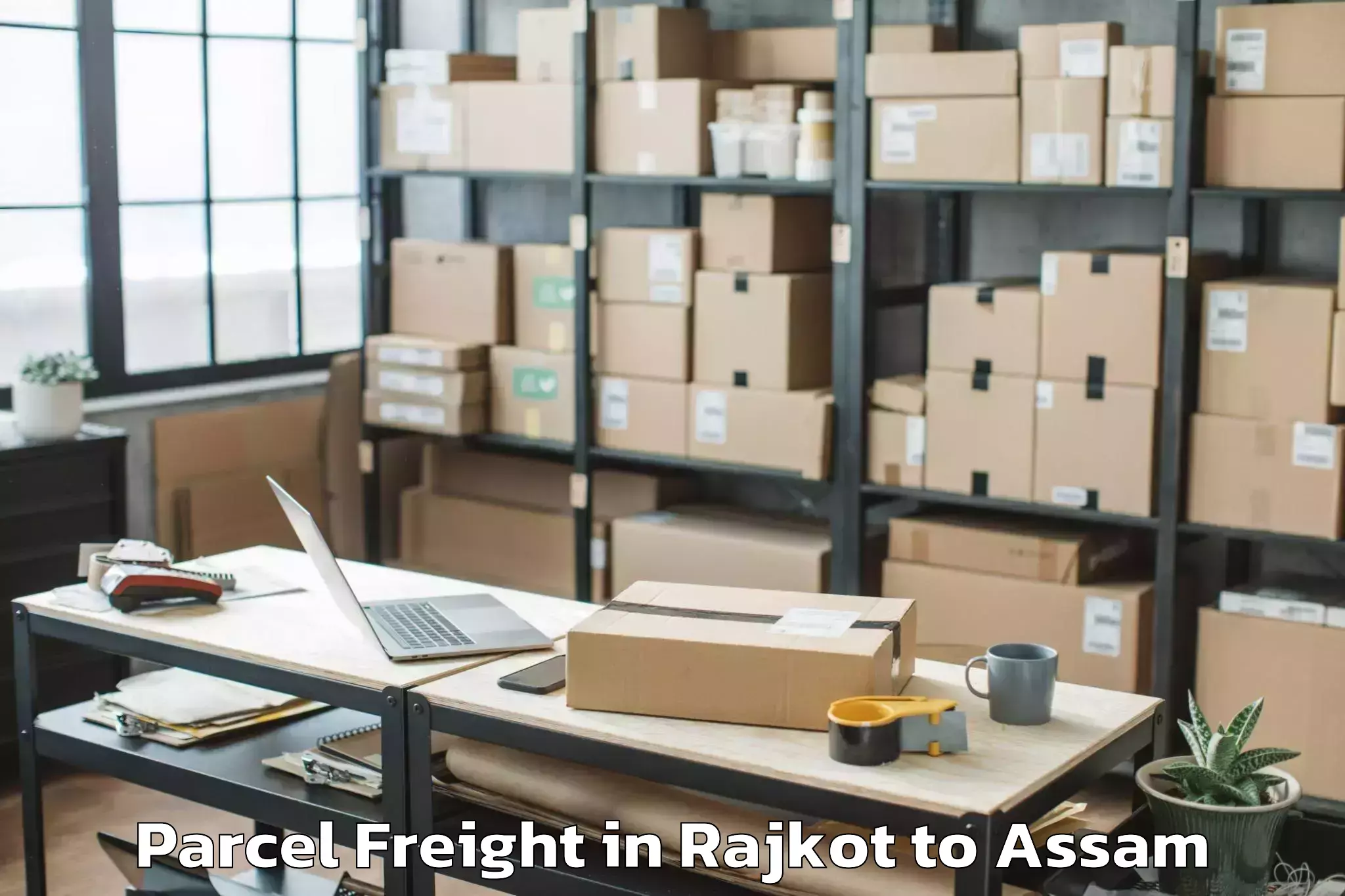 Book Rajkot to Gauripur Parcel Freight